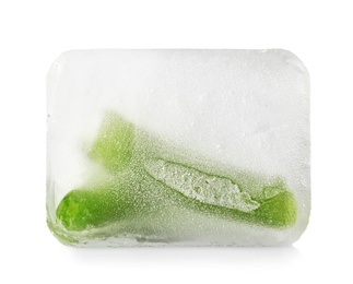 Photo of Fresh green beans in ice cube on white background. Frozen vegetables