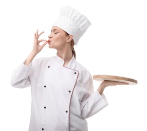 Photo of Happy chef in uniform holding empty wooden board and showing perfect sign on white background