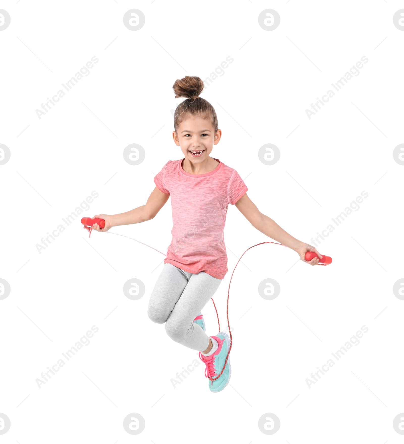 Photo of Full length portrait of girl jumping rope on white background