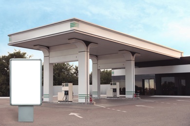 Image of Empty billboard on modern gas station outdoors, space for design