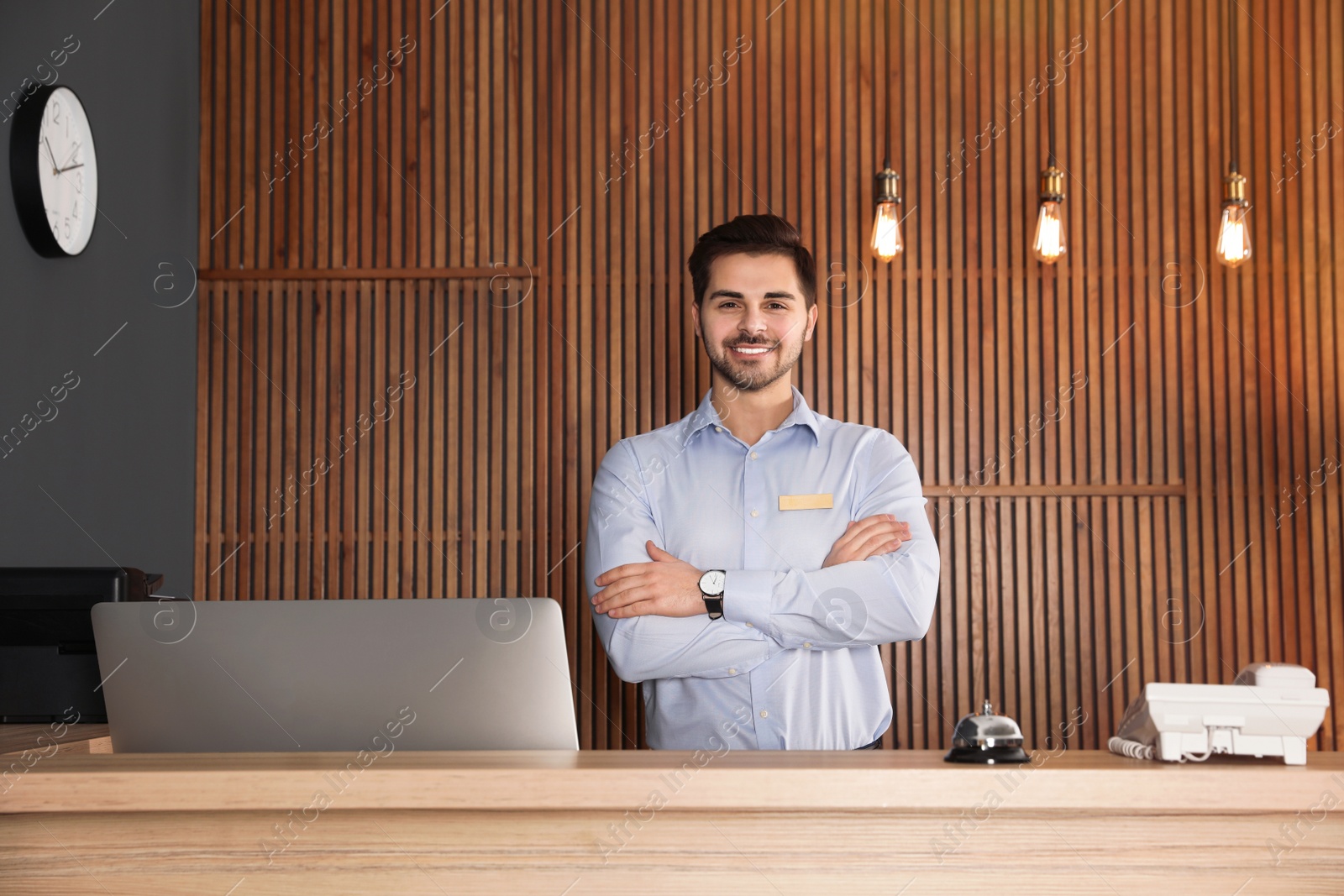 Photo of Portrait of receptionist at desk in lobby