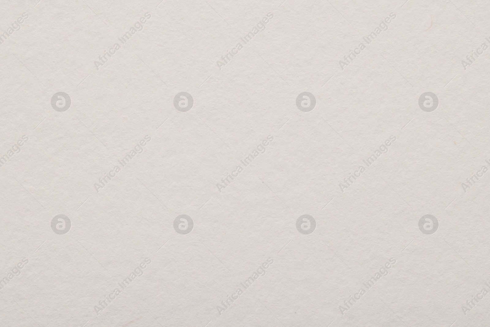 Photo of Texture of white paper sheet as background, top view