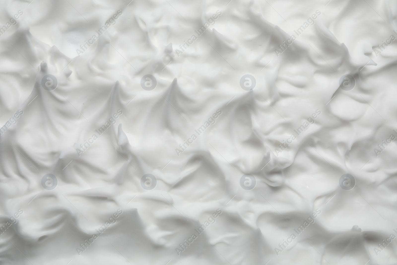 Photo of Texture of white shaving foam as background, top view