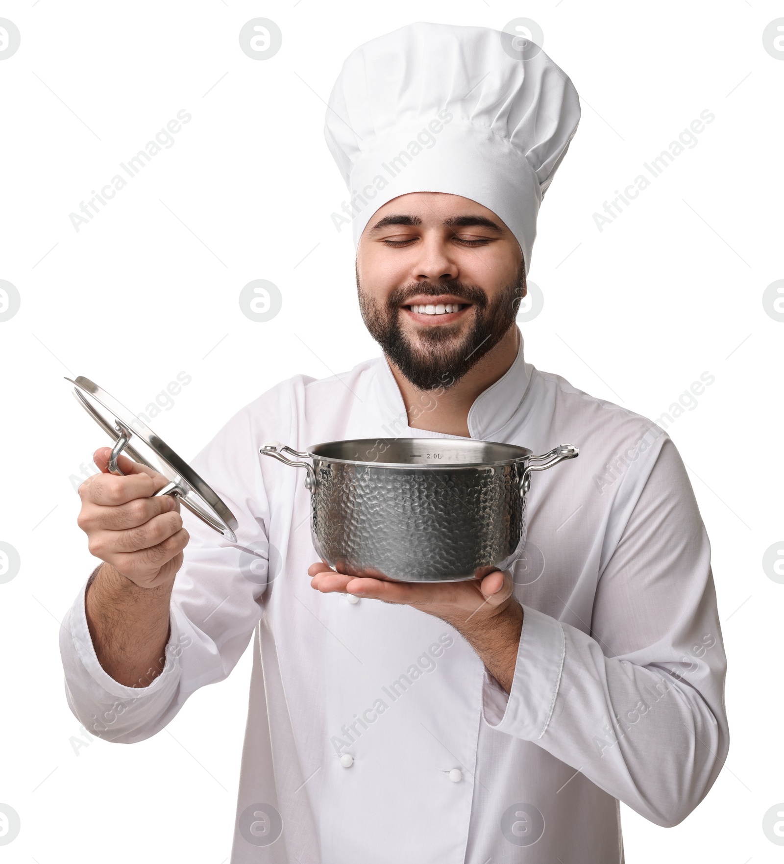 Photo of Happy young chef in uniform holding cooking pot on white background