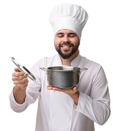 Photo of Happy young chef in uniform holding cooking pot on white background