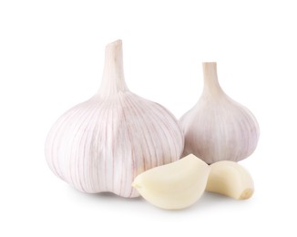 Photo of Heads of fresh garlic and cloves isolated on white