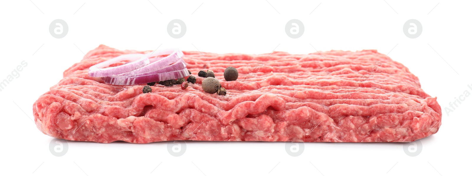 Photo of Raw ground meat, onion and peppercorns isolated on white