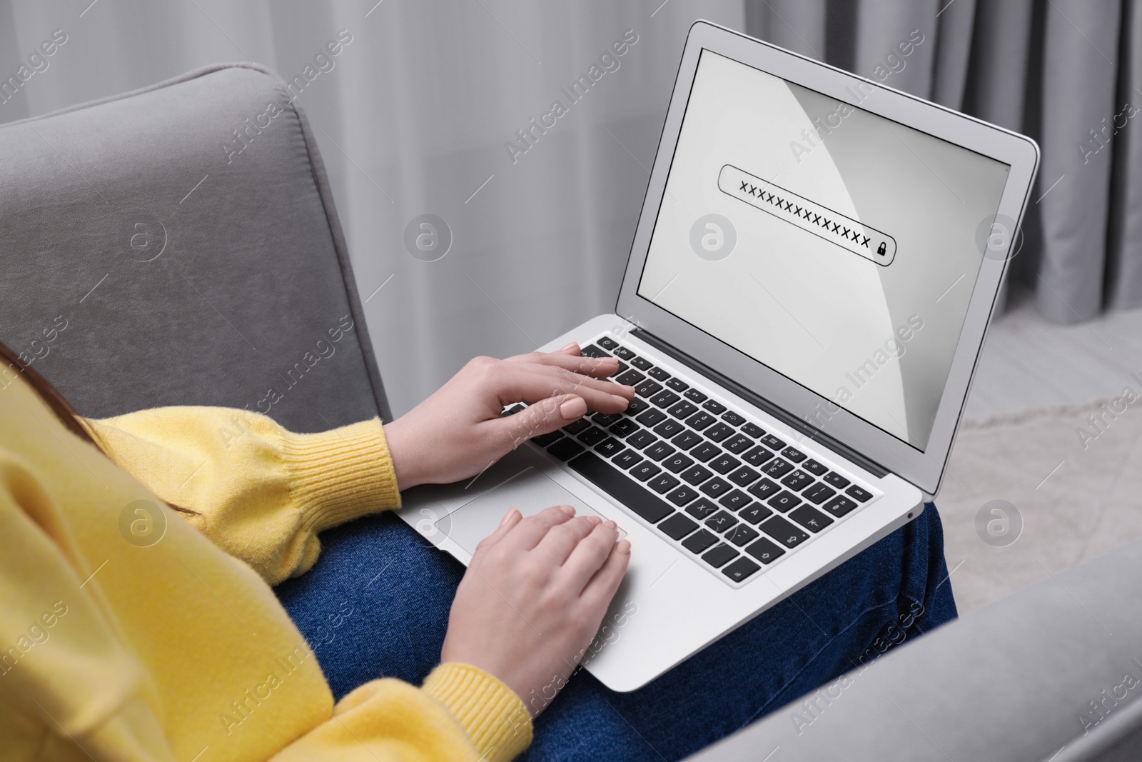 Photo of Woman unlocking laptop with blocked screen indoors, closeup