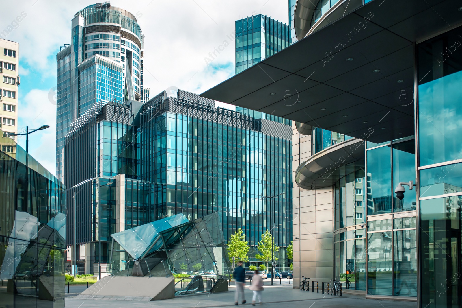 Photo of Beautiful buildings with many windows on cloudy day in city