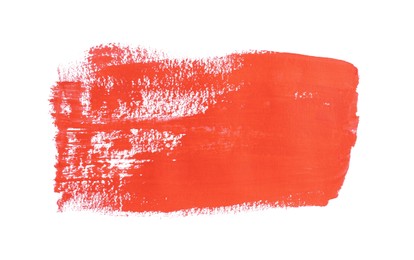 Photo of Red paint stroke drawn with brush on white background, top view