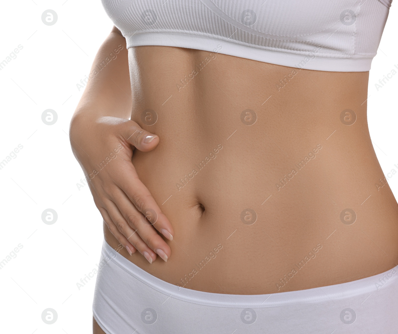 Photo of Woman in underwear touching her belly on white background, closeup. Healthy stomach