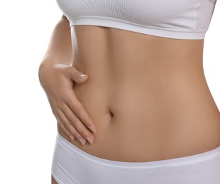 Photo of Woman in underwear touching her belly on white background, closeup. Healthy stomach