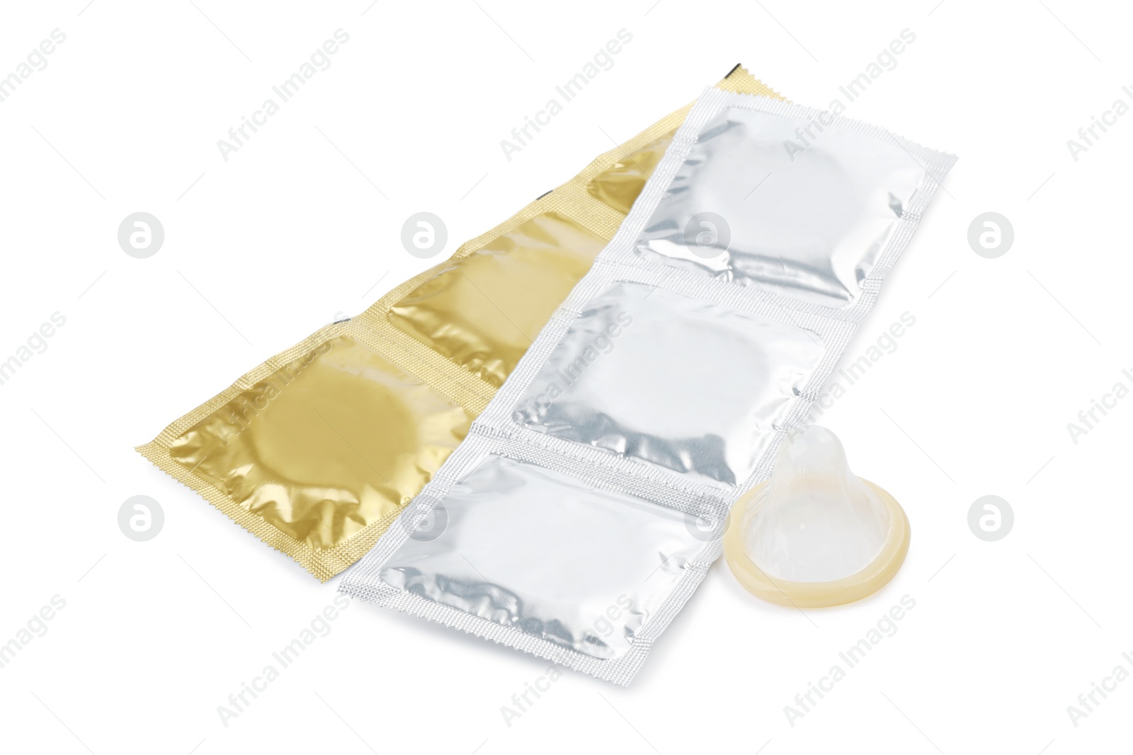 Photo of Unpacked condom and packages on white background. Safe sex