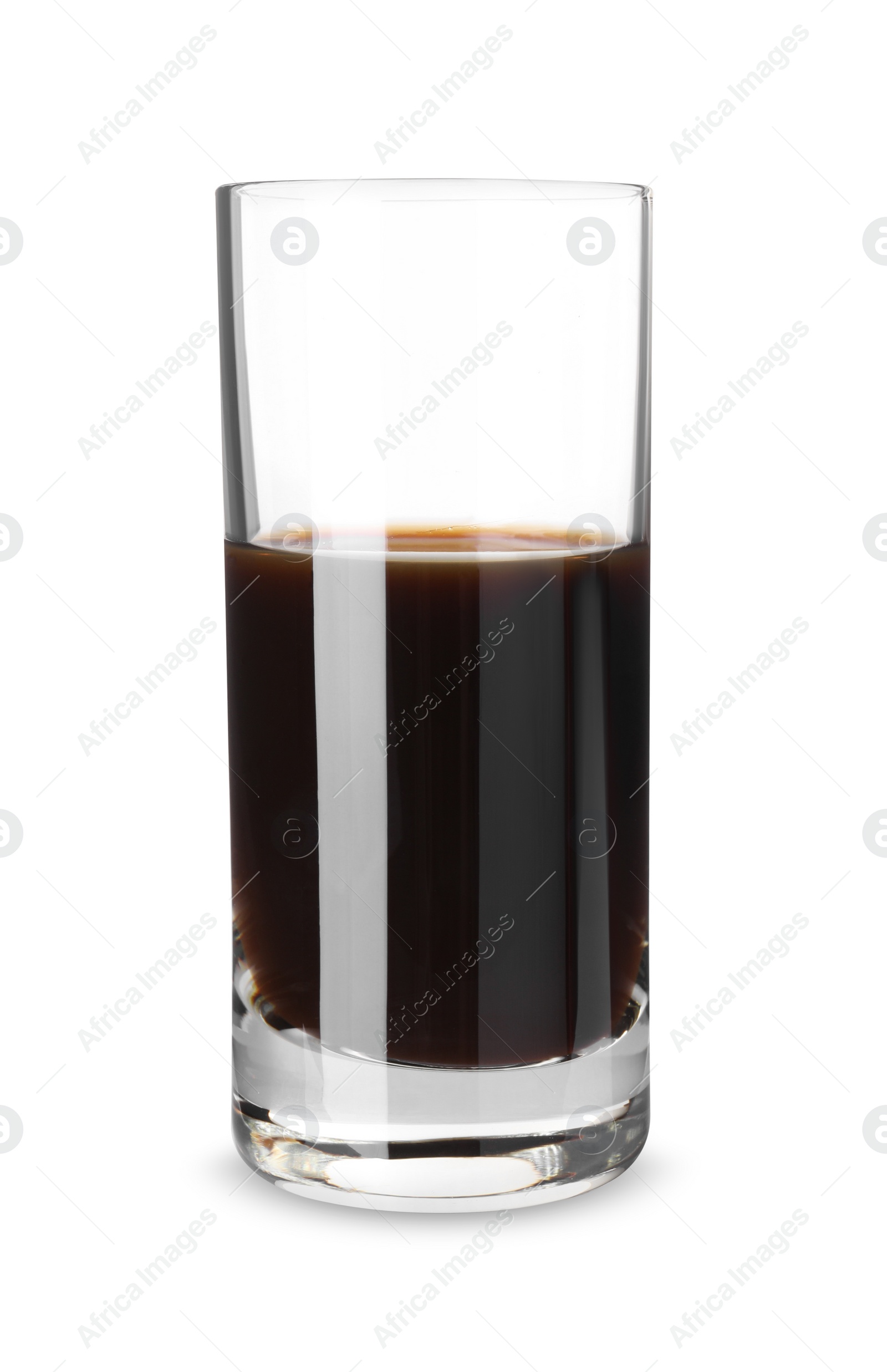 Photo of Shot glass with coffee liqueur isolated on white