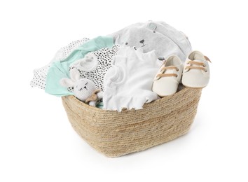 Photo of Laundry basket with baby clothes, shoes and toy isolated on white
