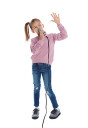 Photo of Cute funny girl with microphone on white background