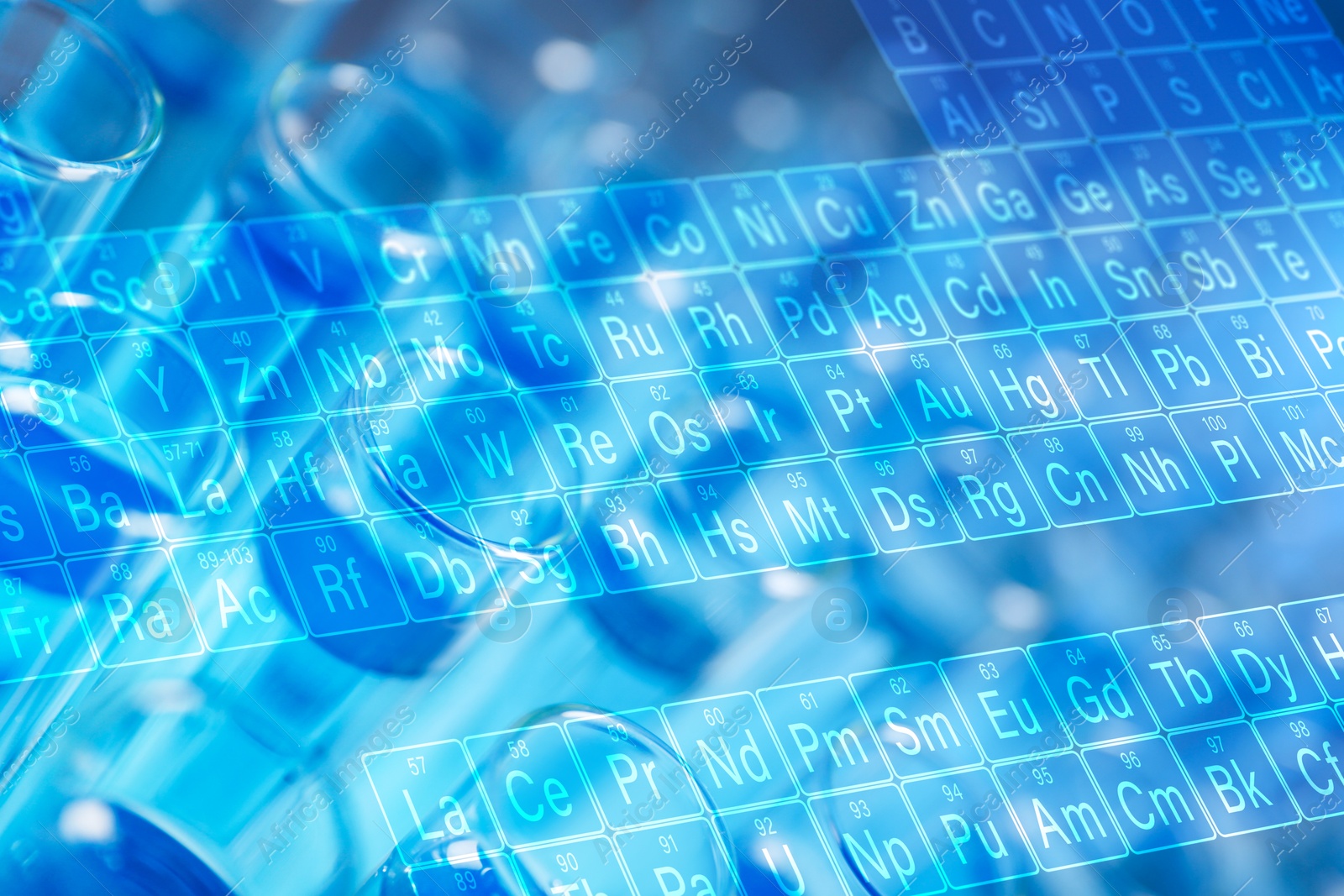 Image of Studying chemistry. Periodic table and test tubes, double exposure