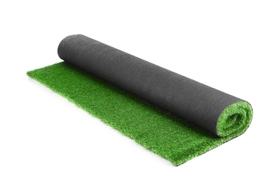 Rolled artificial grass carpet on white background. Exterior element