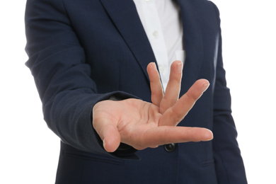 Photo of Woman showing something against white background, focus on hand