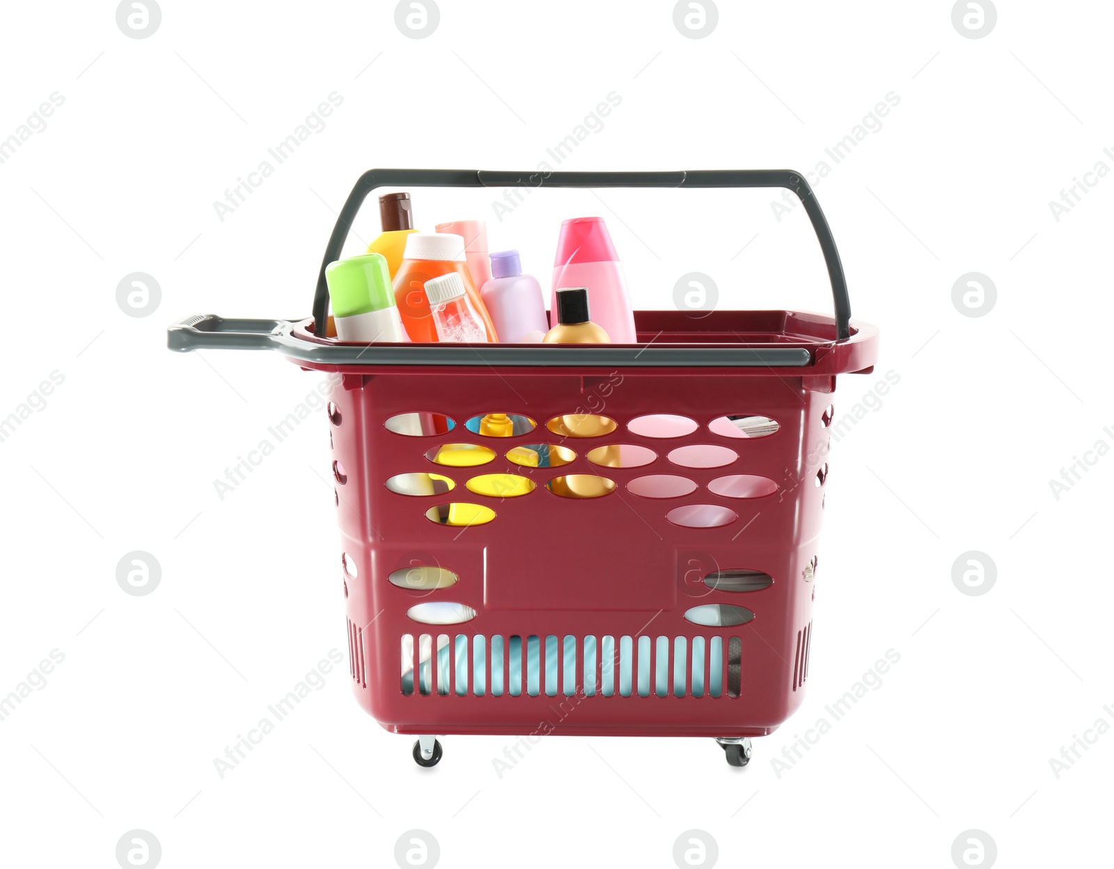 Photo of Shopping basket full of cleaning supplies isolated on white