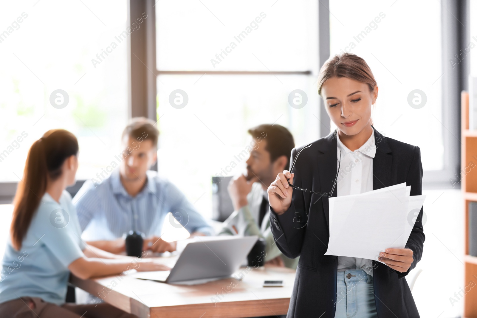 Photo of Office employees having business training at workplace