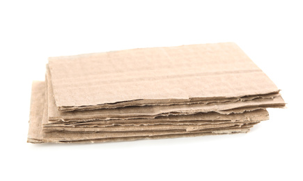 Photo of Pieces of brown cardboard isolated on white