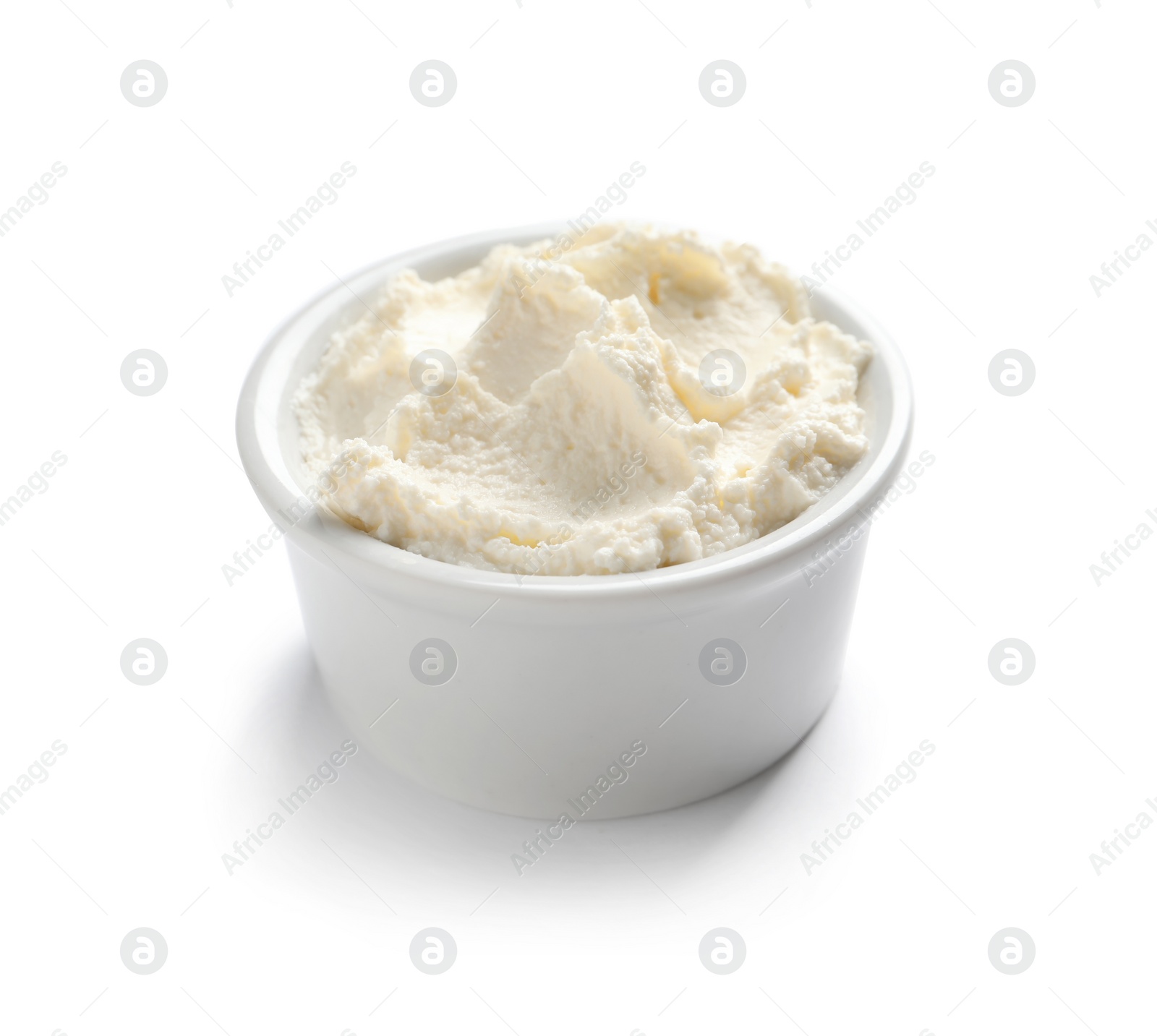 Photo of Bowl of tasty cream cheese on white background