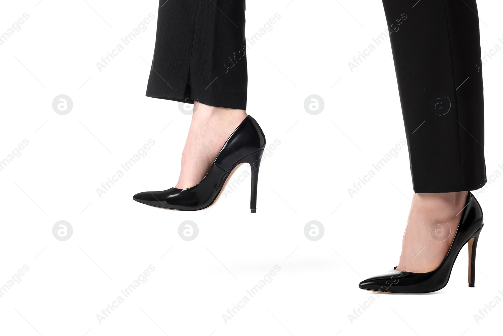 Photo of Businesswoman in leather shoes on white background, closeup