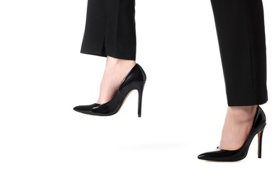 Photo of Businesswoman in leather shoes on white background, closeup