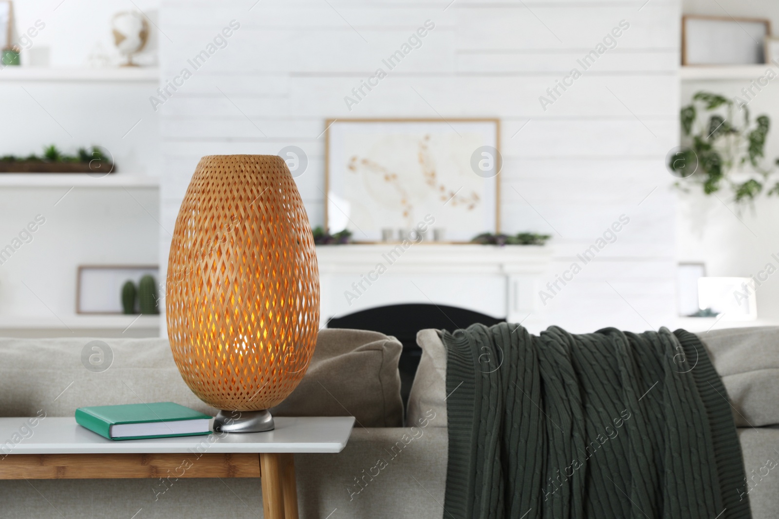 Photo of Console table with stylish decor in living room