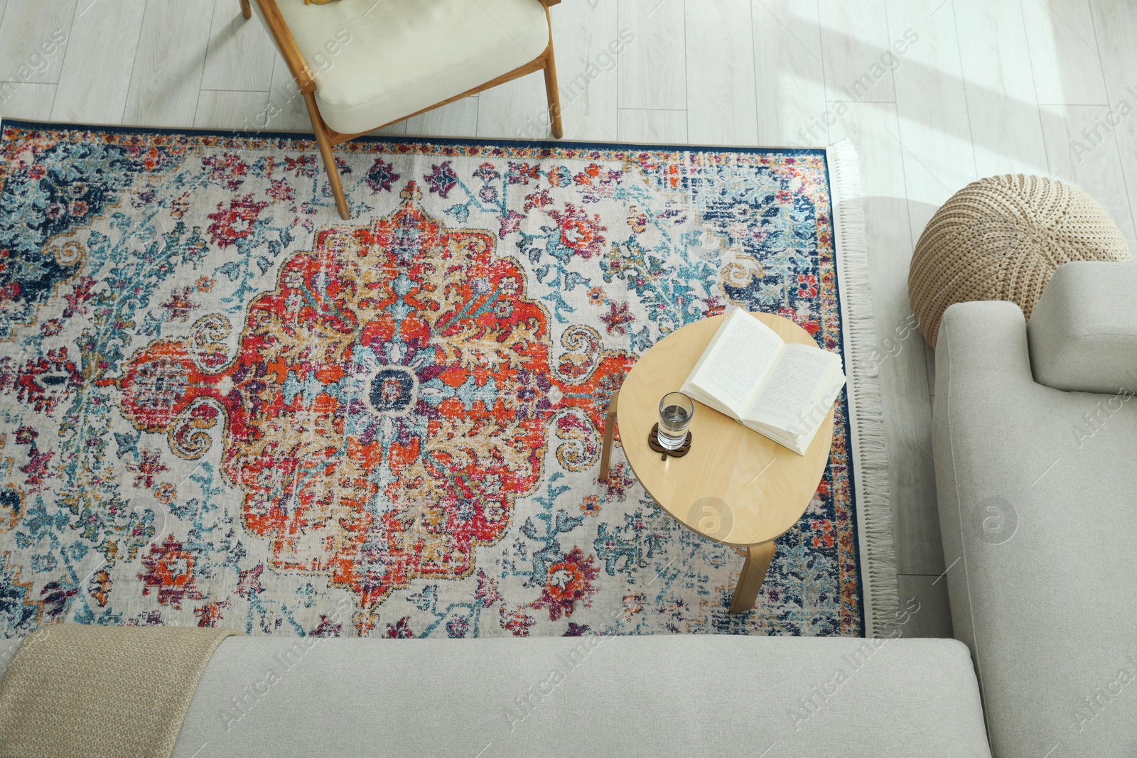 Photo of Stylish living room with beautiful carpet and furniture, top view. Interior design