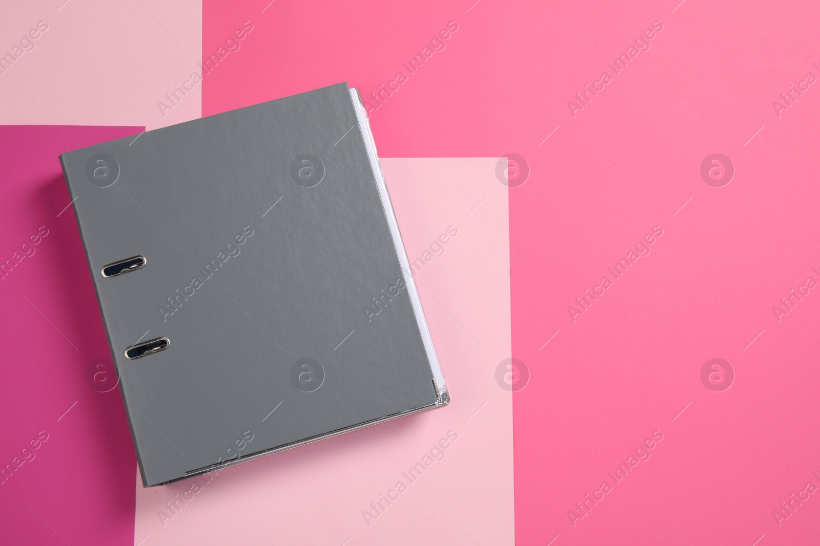 Photo of Grey office folder on color background, top view, Space for text