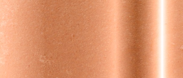 Image of Shiny bronze surface as background, closeup view