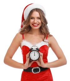 Photo of Beautiful Santa girl with alarm clock on white background. Christmas celebration