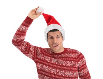 Photo of Surprised handsome man wearing Santa hat on white background