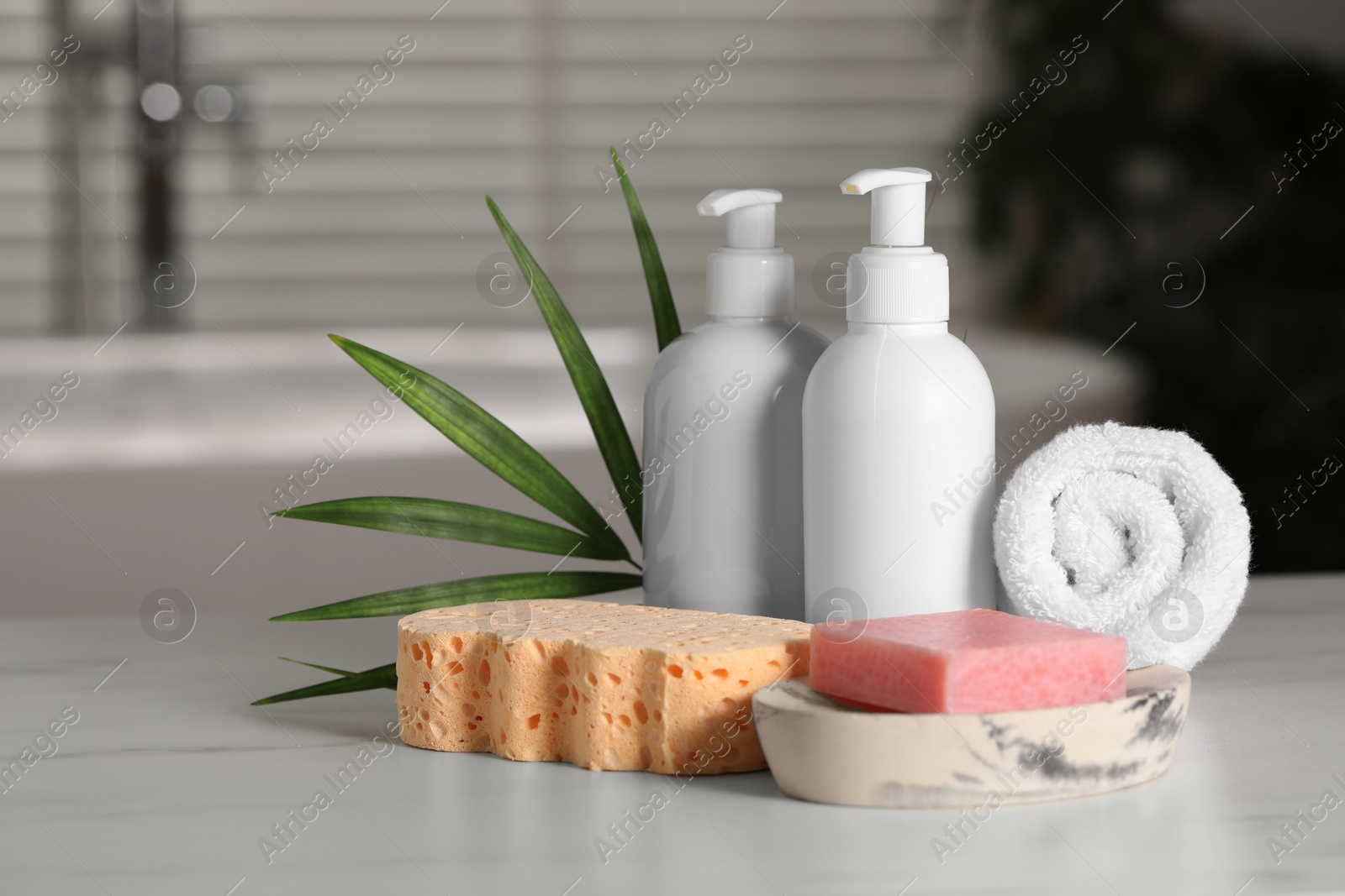 Photo of Composition with spa products on white marble table indoors, space for text