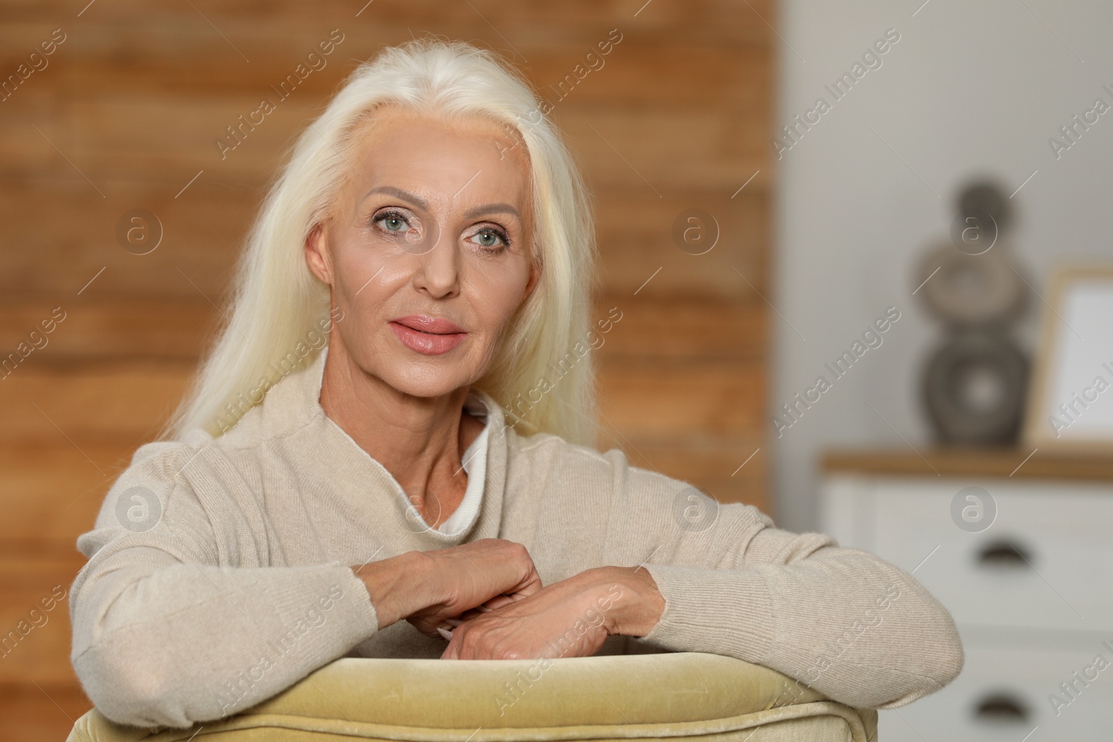 Photo of Portrait of elegant mature woman at home