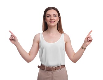 Photo of Beautiful businesswoman pointing at something against white background