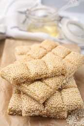 Delicious sesame kozinaki bars on table, closeup