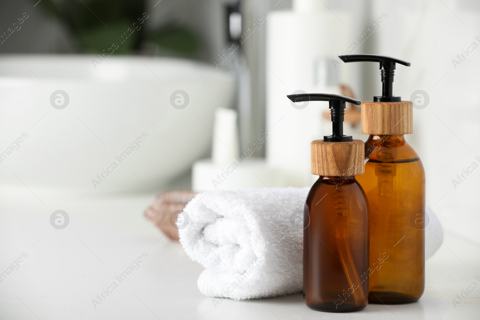 Photo of Different personal care products on countertop in bathroom, closeup. Space for text