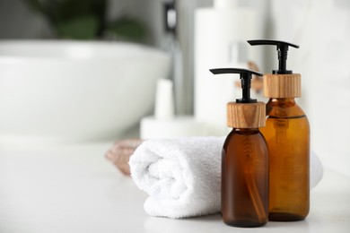 Photo of Different personal care products on countertop in bathroom, closeup. Space for text