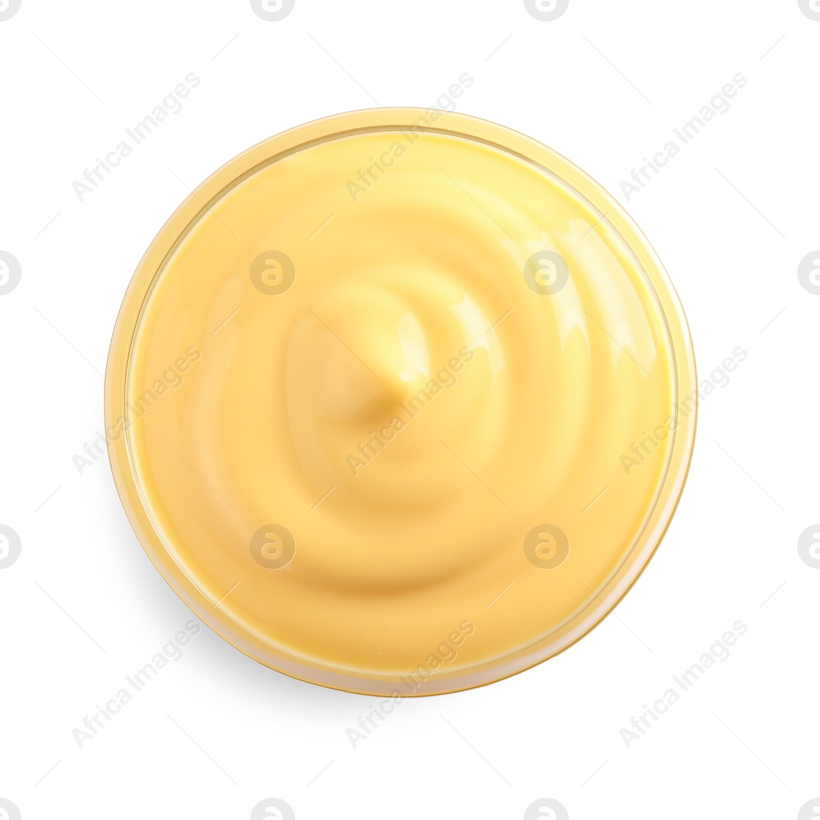 Photo of Delicious cheese sauce in bowl on white background, top view