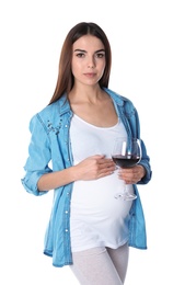 Future mother with glass of wine on white background. Alcohol abuse during pregnancy