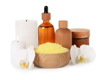 Beautiful spa composition with different care products and flowers on white background