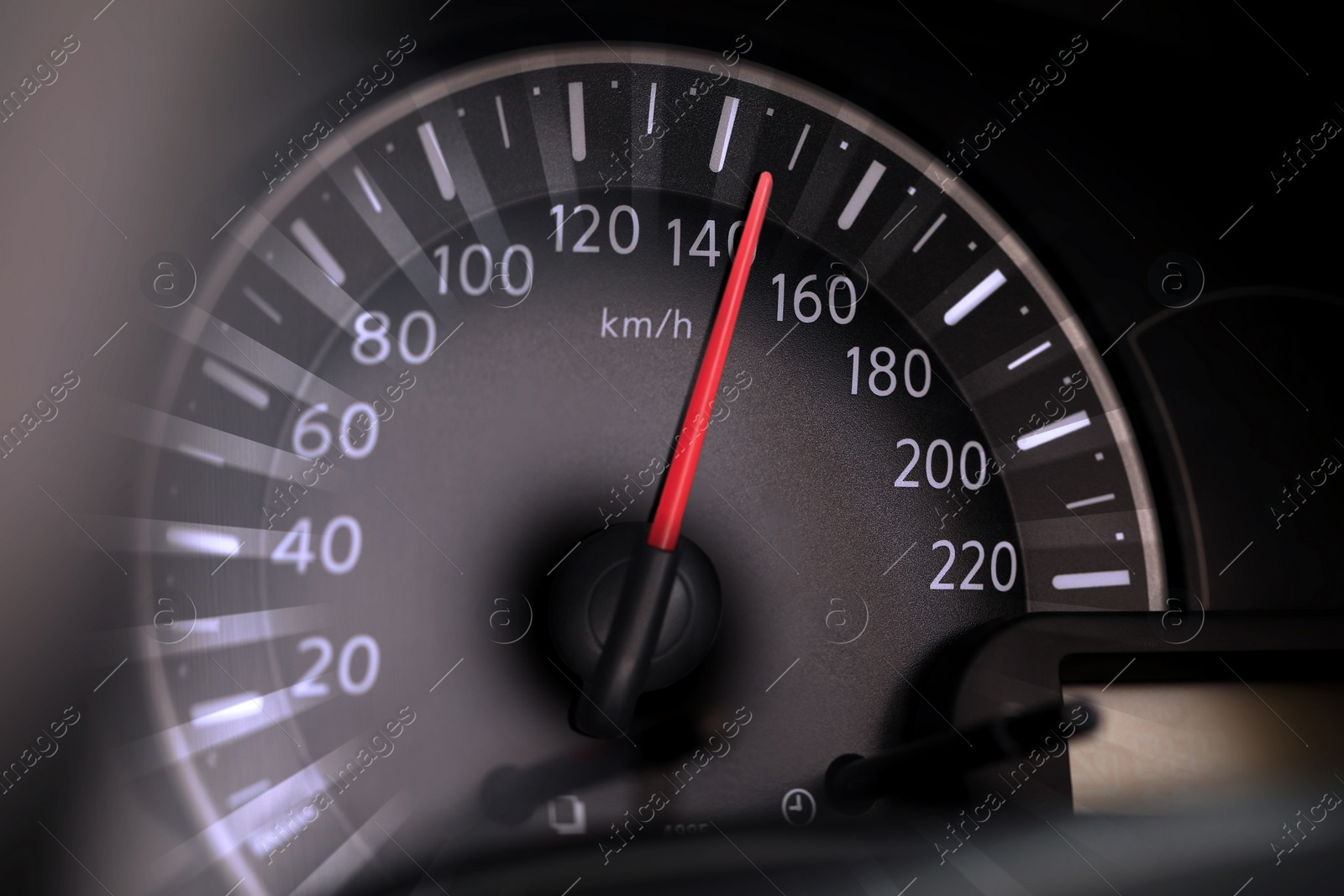 Image of Speedometer on car dashboard, closeup. Motion blur effect