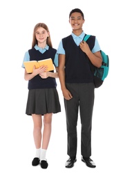 Full length portrait of teenagers in school uniform on white background