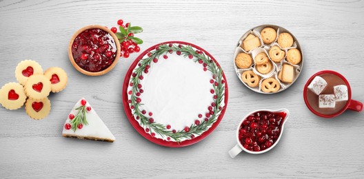 Image of Flat lay composition with different delicious pies on white wooden table. Banner design
