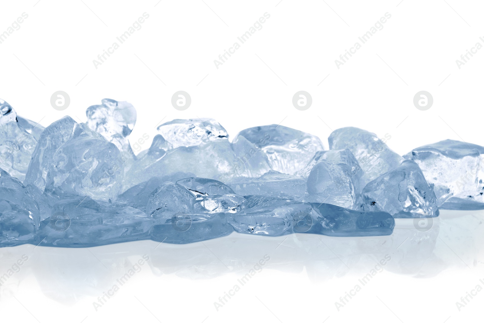 Photo of Pieces of crushed ice isolated on white