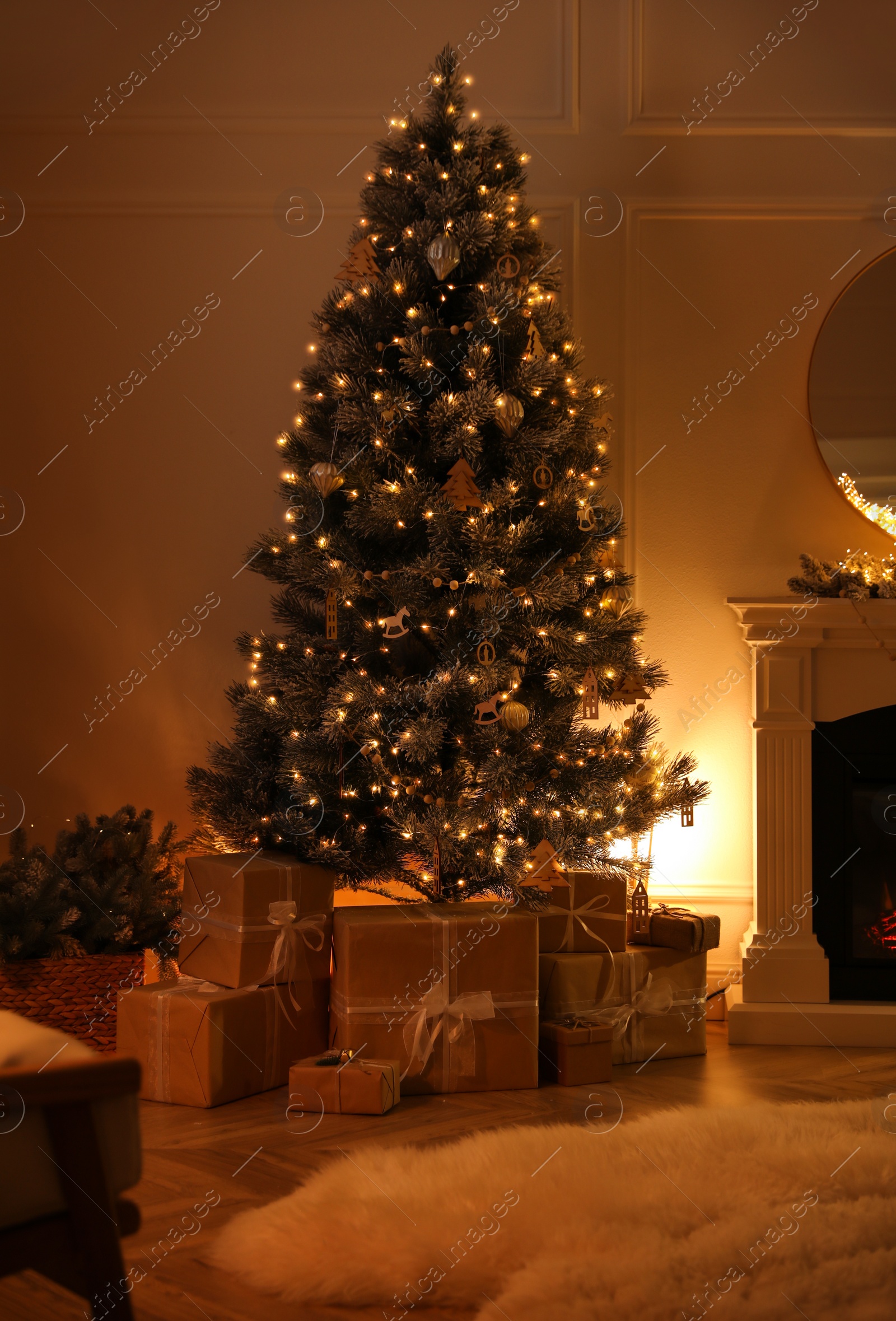 Photo of Beautiful living room interior with Christmas tree and fireplace