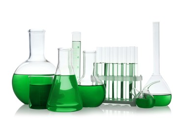 Image of Laboratory glassware with green liquid isolated on white